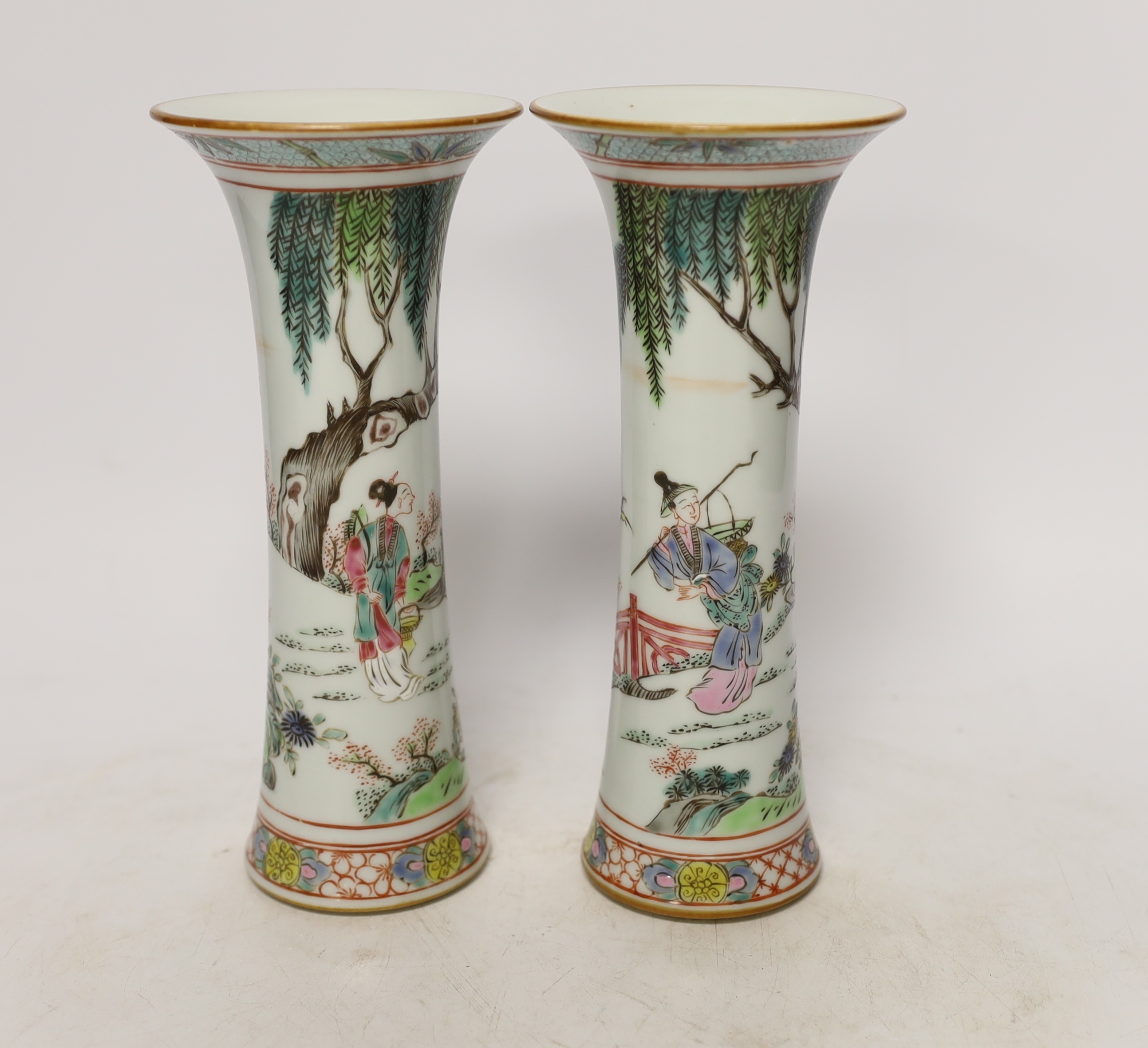 A pair of Chinese famille rose vases, 21cm